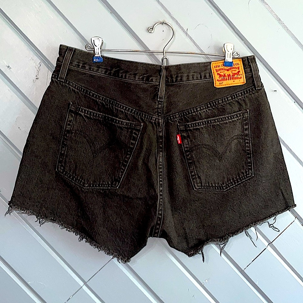 Levi’s 501 button fly black cut off jean shorts